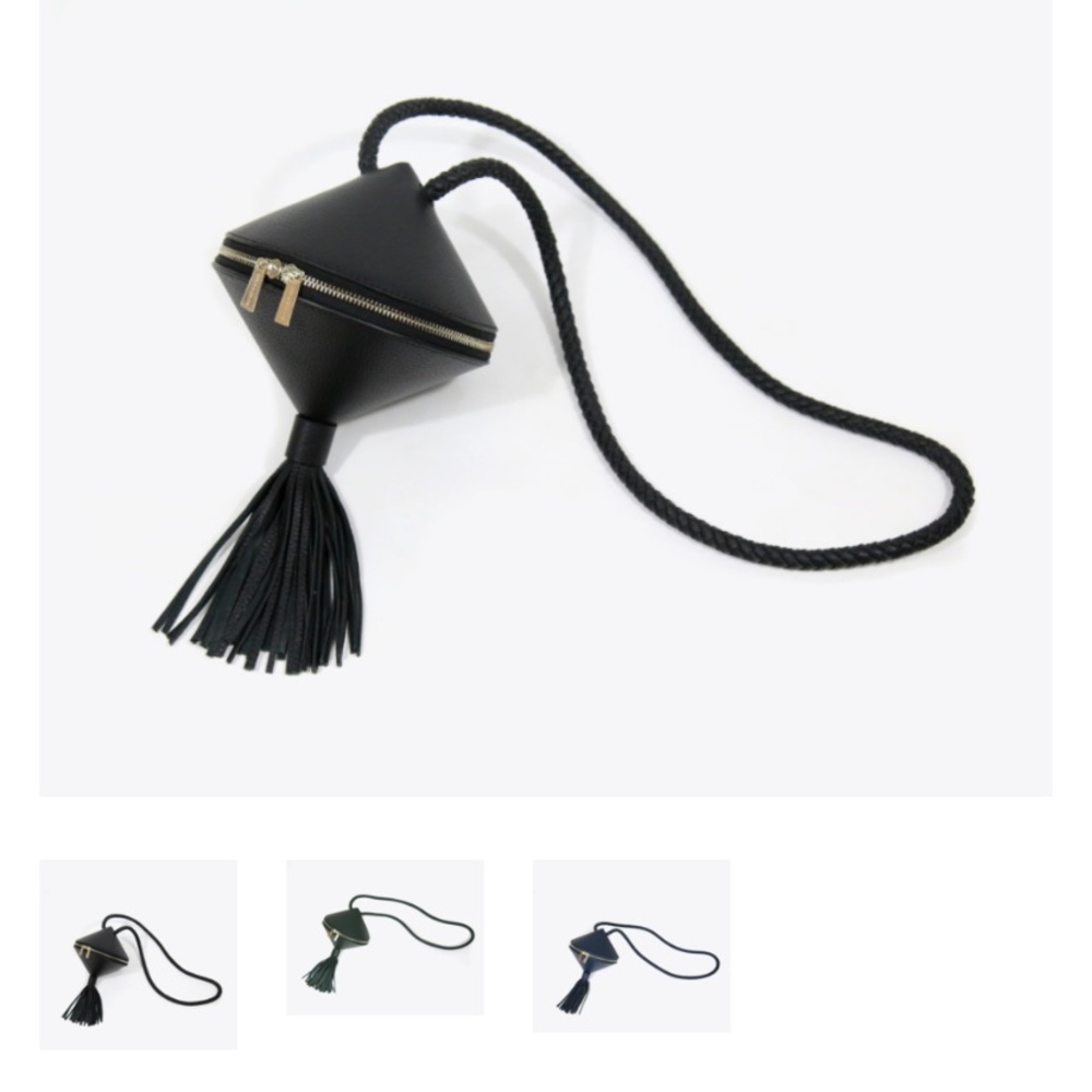 LOOKING FOR NEELY & CHLOE SPIN TOP BAG